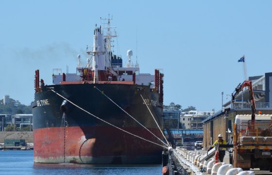 Front-on view of bulk carrier ship tied to the wharf at Fremantle Port