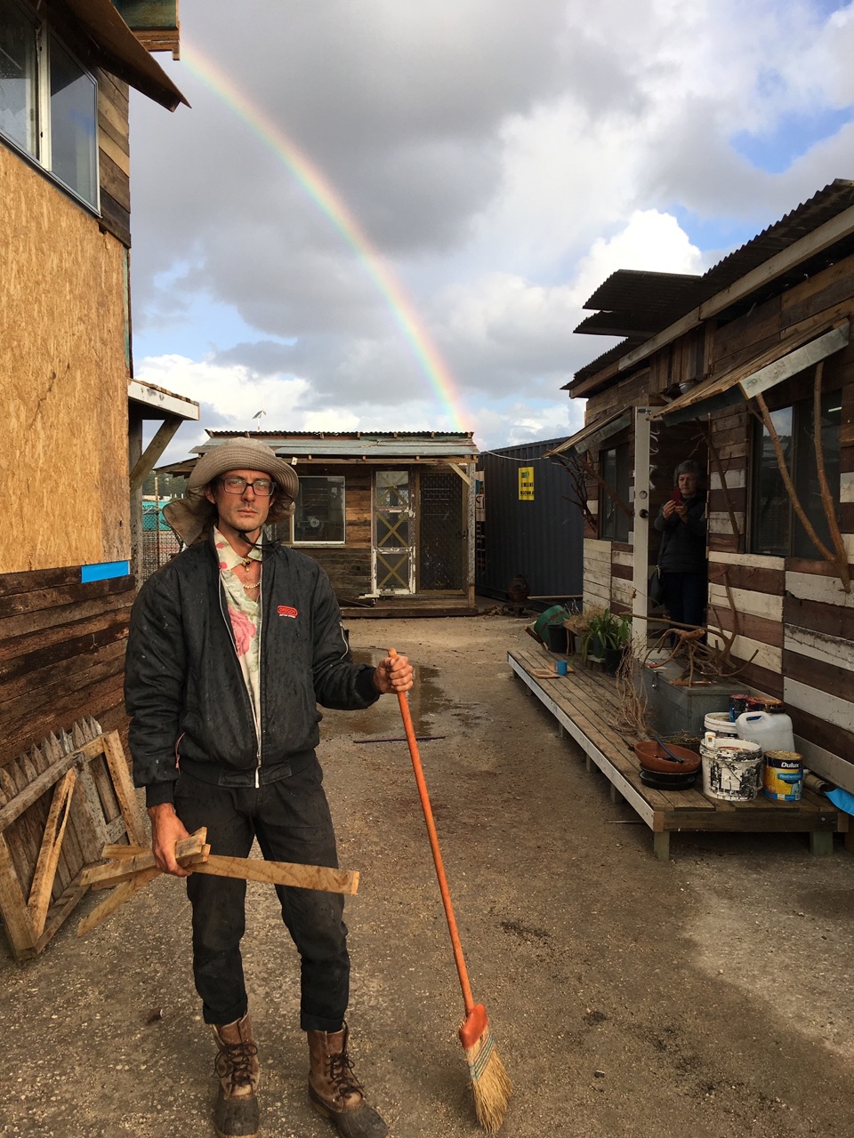 Jessee under a rainbow at his resort